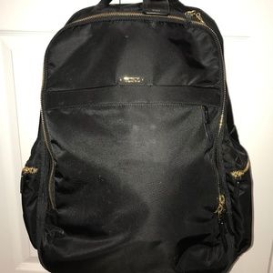 Black Tumi Backpack with Gold Hardware